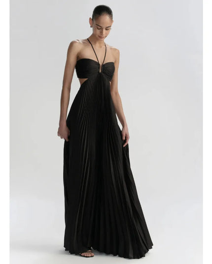Black halter maxi dress with pleated skirt shown from the front, featuring a center cutout
