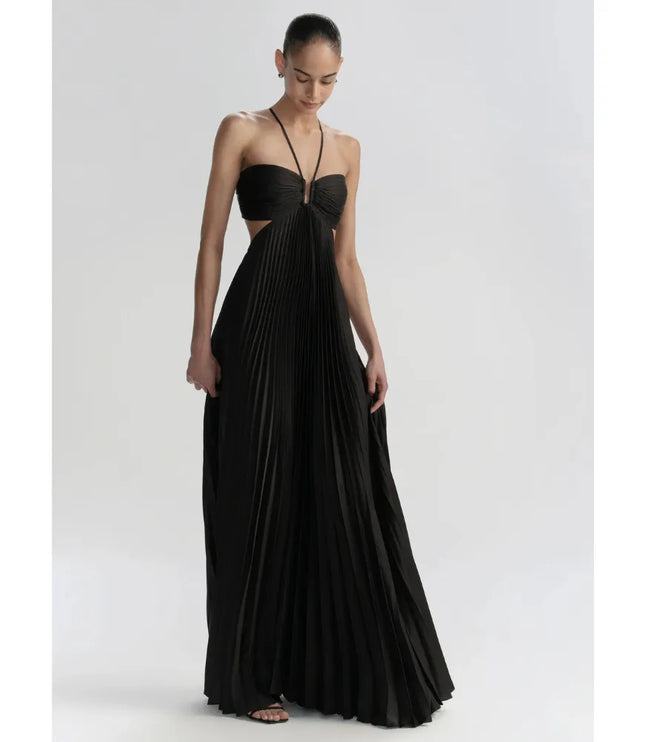 Black halter maxi dress with pleated skirt shown from the front, featuring a center cutout