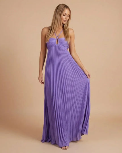 Front view of lavender pleated halter maxi dress with gathered bodice and flowing pleated skirt