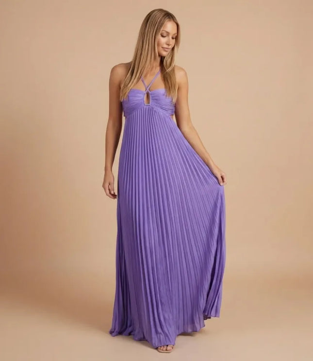 Front view of lavender pleated halter maxi dress with gathered bodice and flowing pleated skirt
