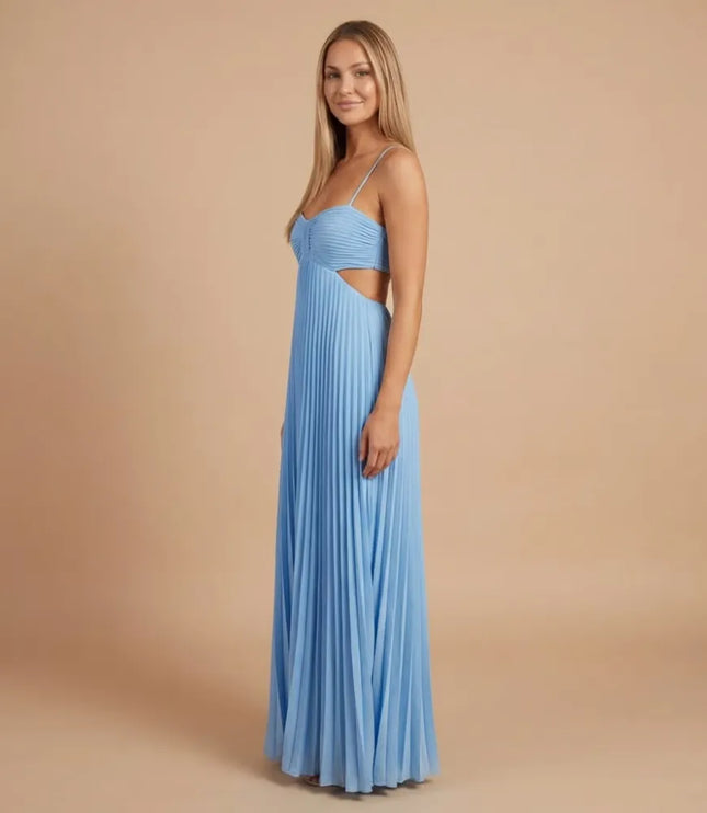 Side view of a light blue pleated halter maxi dress with cutout waist and flowing skirt