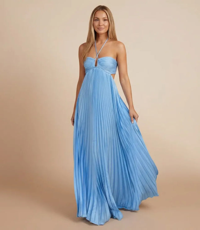 Front view of a light blue pleated halter maxi dress with crisscross straps and side cutout