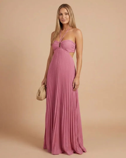 Front view of pink pleated halter maxi dress with ruched bust and side cutout