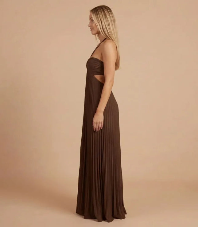 Side view of chocolate brown pleated halter maxi dress showing fit and floor-length pleats