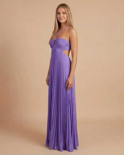 Front angled view of lavender pleated halter maxi dress with ruched bust and side cutout