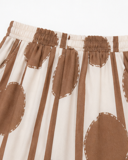 Women's Printed Wide Leg Pants with a Flowing Asymmetric Top