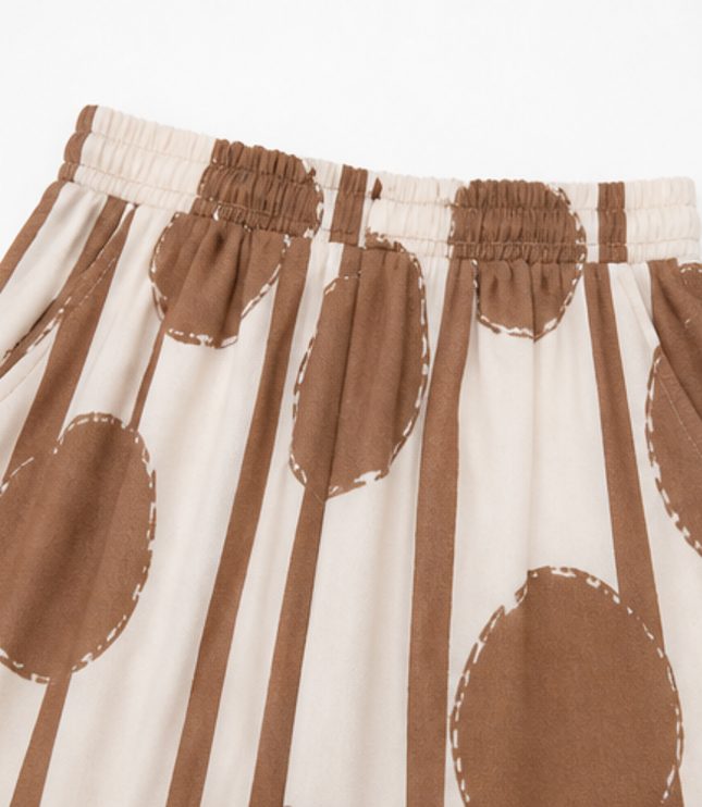 Women's Printed Wide Leg Pants with a Flowing Asymmetric Top