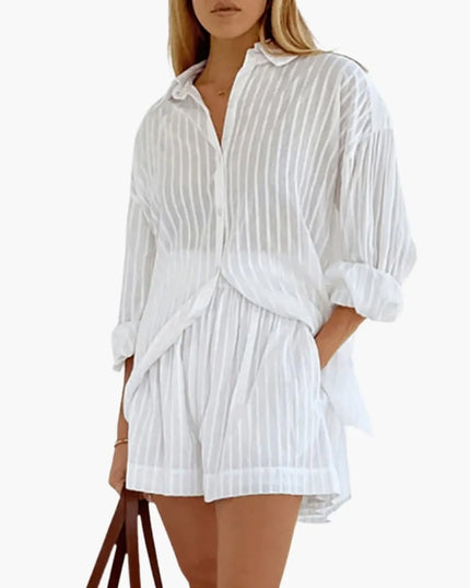 White pinstriped button-down collared pleated mini dress with puffed sleeves