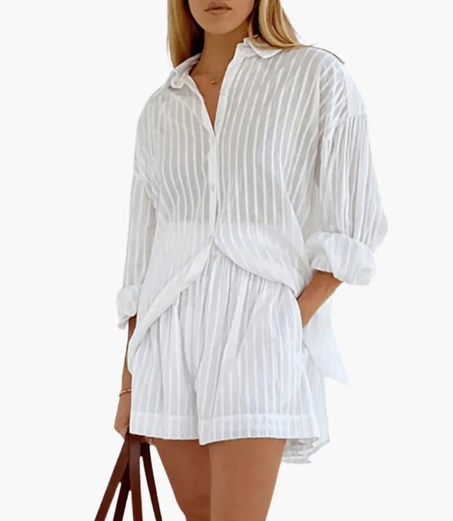 White pinstriped button-down collared pleated mini dress with puffed sleeves