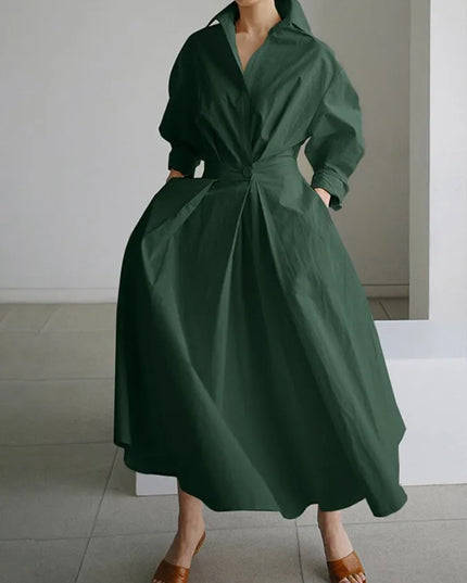 Forest green wrap v-neck midi dress with puffy sleeves, front angle