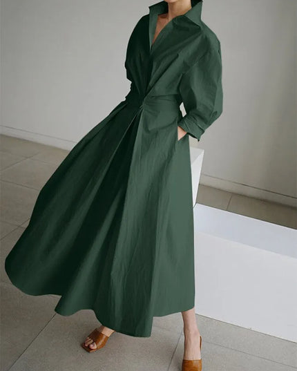 Dark green wrap midi dress with voluminous puffed sleeves and full skirt