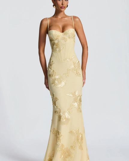 Cream maxi dress with gold embroidered sunflowers and spaghetti straps front