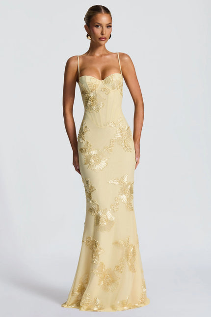 Cream maxi dress with gold embroidered sunflowers and spaghetti straps front