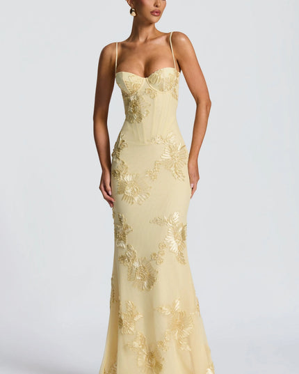 Cream maxi dress with gold floral embroidery and sweetheart neckline front view