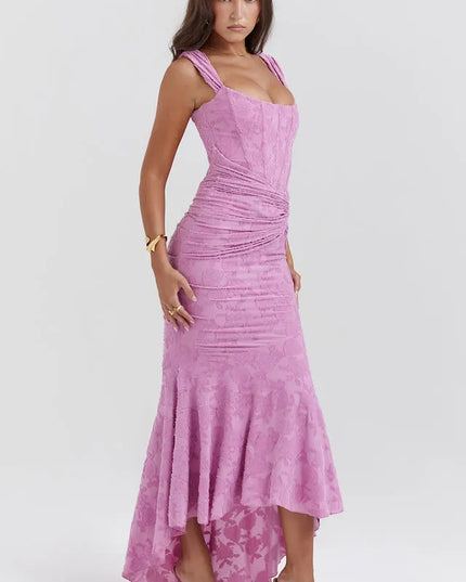 Side profile of pink ruched maxi dress with square neckline
