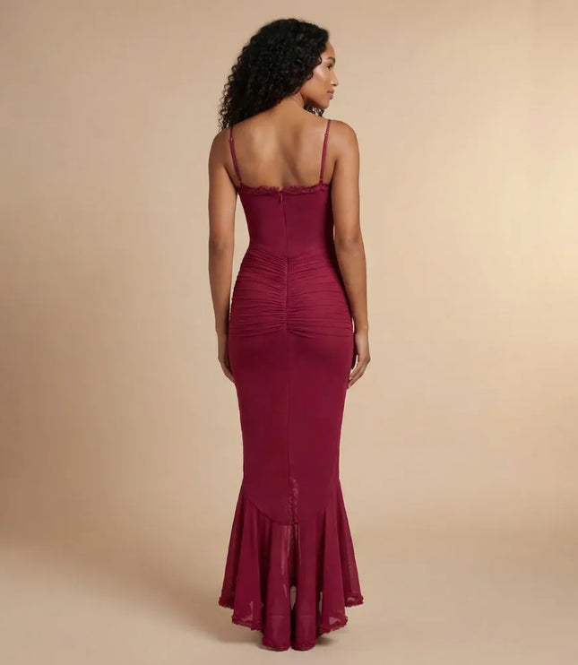 Back view of burgundy spaghetti strap ruched maxi dress with sheer hem