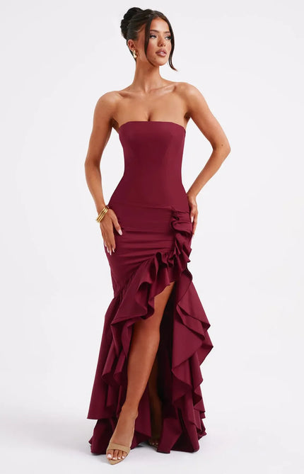 Burgundy strapless ruffled maxi dress with asymmetrical side slit