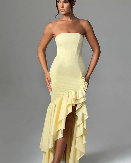 Pale yellow strapless maxi dress with asymmetrical ruffled side slit