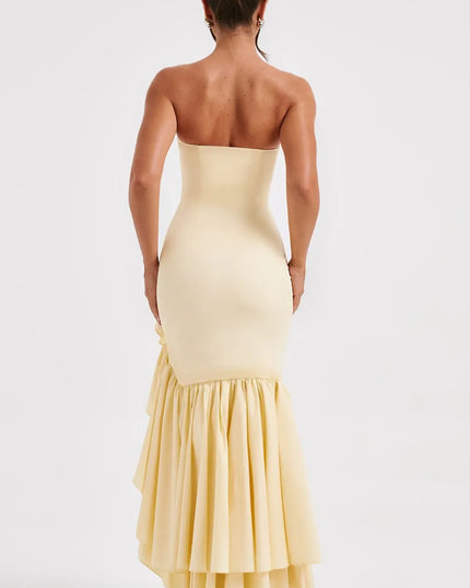 Pale yellow strapless maxi dress with tiered ruffled hem, back view