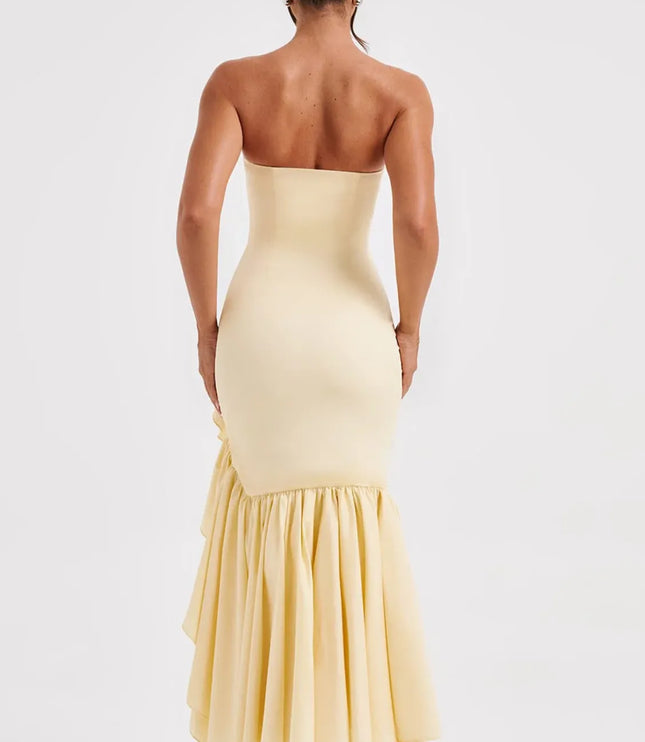 Pale yellow strapless maxi dress with tiered ruffled hem, back view