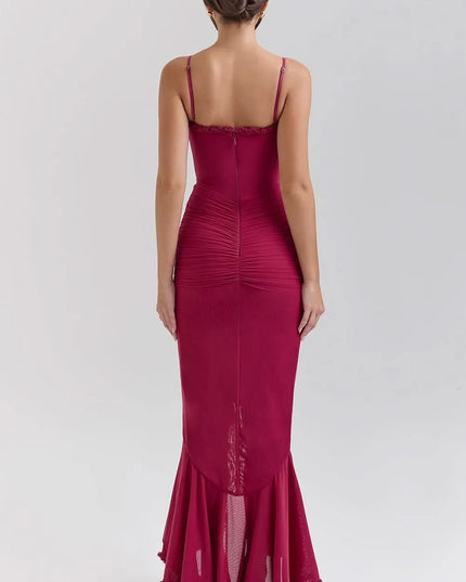 Back view of fuchsia ruffled sweetheart maxi dress with straps and zipper closure