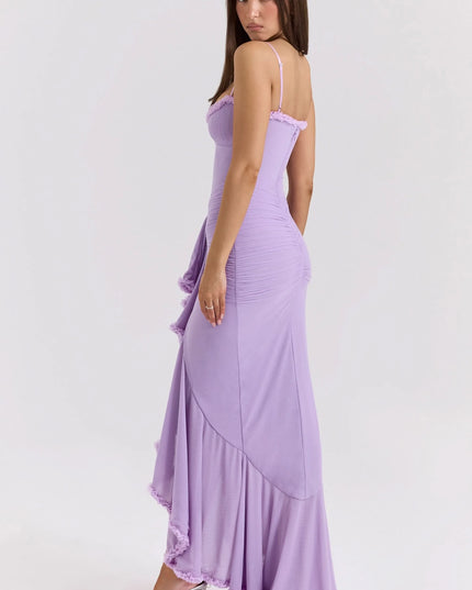 Side view of lavender ruffled sweetheart maxi dress with fitted waist and flowing skirt