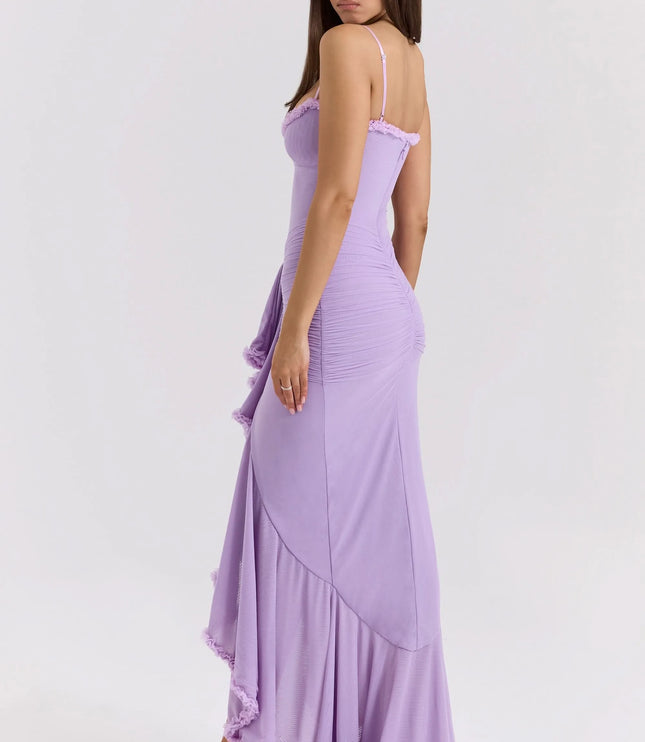 Side view of lavender ruffled sweetheart maxi dress with fitted waist and flowing skirt