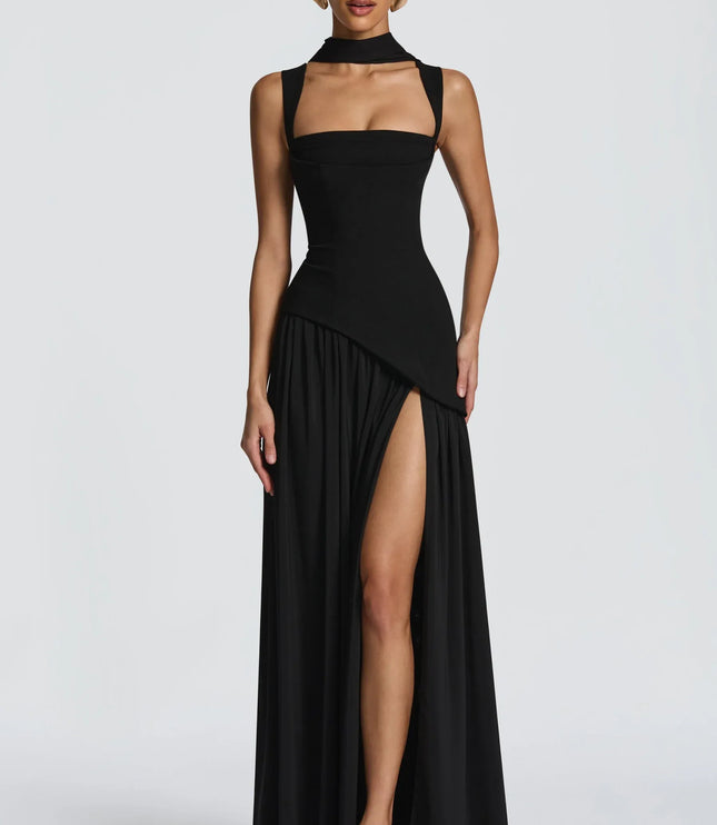 Front view of black maxi formal dress with high slit and asymmetrical overlay