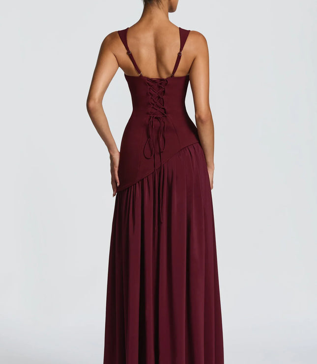 Back view of burgundy maxi formal dress with lace-up back and full-length skirt