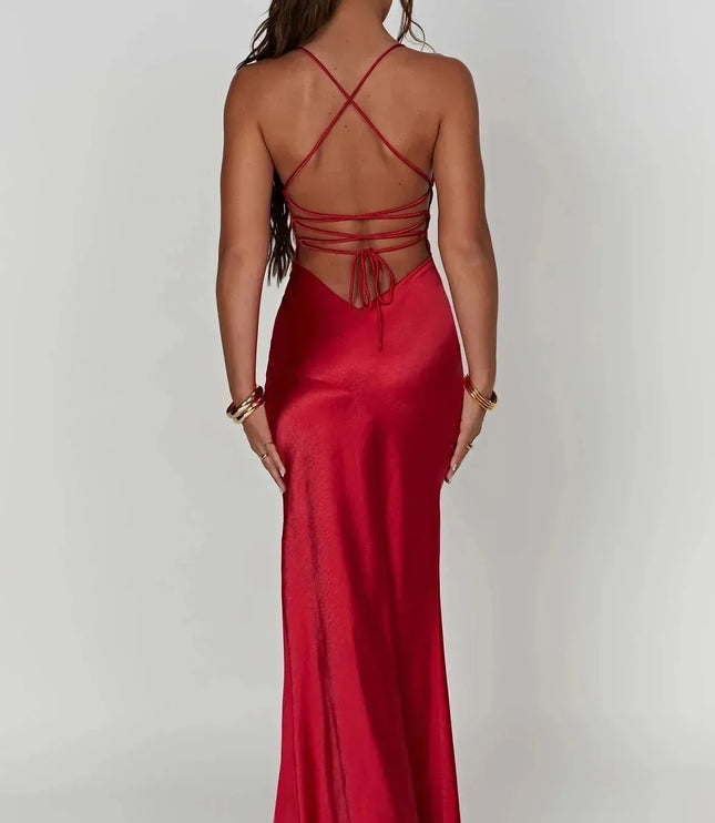 Back view of red satin maxi dress with crisscross straps and open back