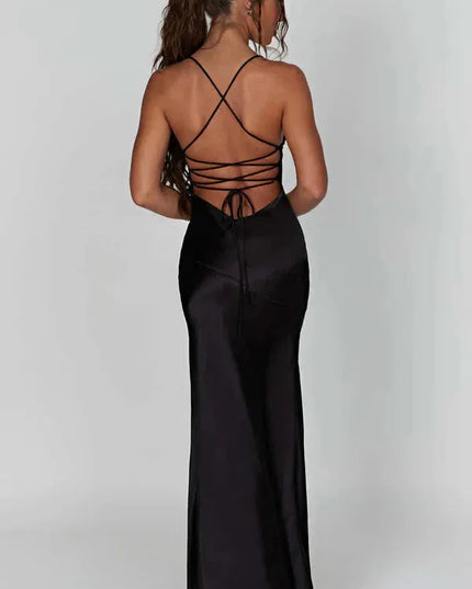 Back view of black satin maxi dress with crisscross open back and lace-up ties
