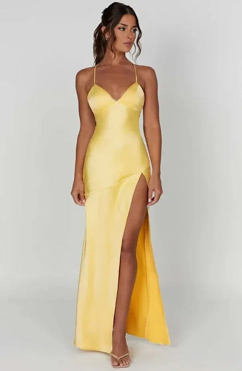 Pale yellow satin V neck maxi dress with thin straps and high slit, front view