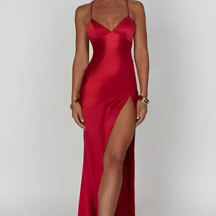 Red satin V neck maxi dress with thin straps and high slit, front view