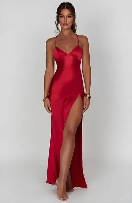 Red satin V neck maxi dress with thin straps and high slit, front view