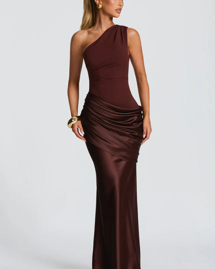 Burgundy satin one-shoulder maxi dress with draped bodice and side slit, side view