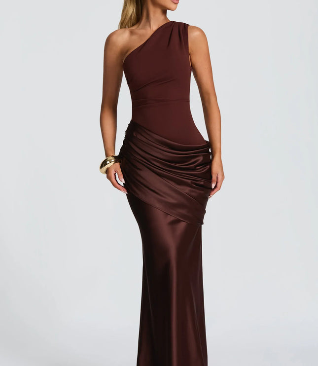 Burgundy satin one-shoulder maxi dress with draped bodice and side slit, side view