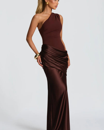 Burgundy formal one-shoulder maxi dress showing ruched hip detail and flowing skirt