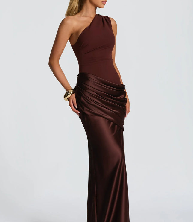 Burgundy formal one-shoulder maxi dress showing ruched hip detail and flowing skirt
