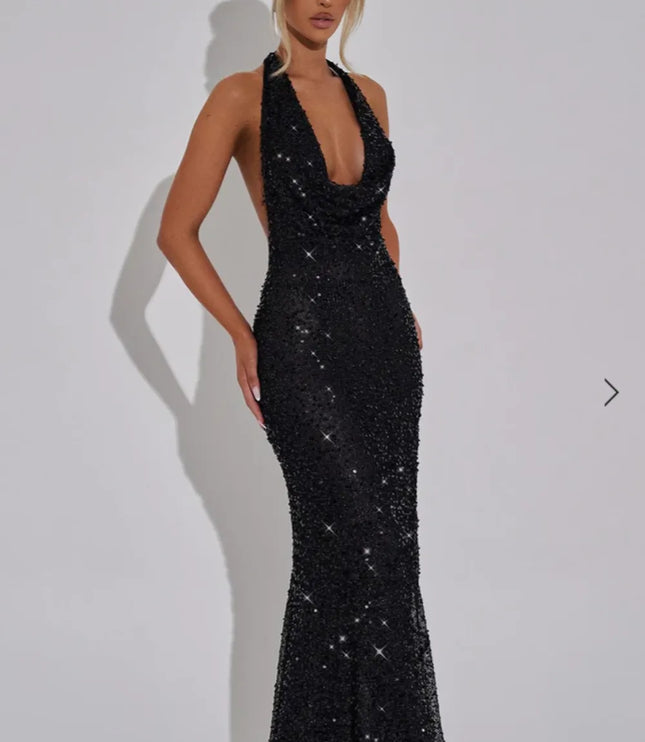 Black sequin halter maxi dress with plunging neckline and fitted silhouette