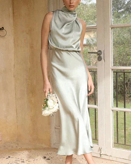 Sage green halter midi dress with draped cowl neckline