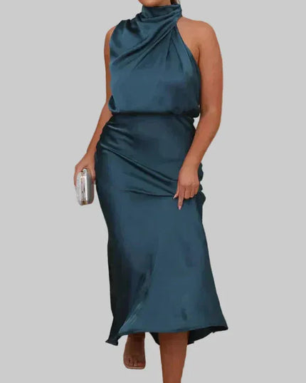 Teal sleeveless halter midi dress with draped neckline and fitted waist