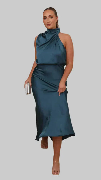 Teal sleeveless halter midi dress with draped neckline and fitted waist