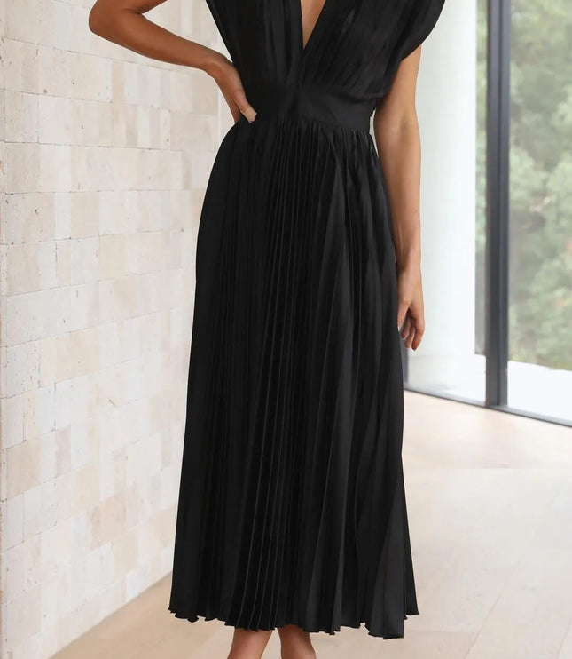 Black pleated midi dress front view with deep v-neckline and cinched waist