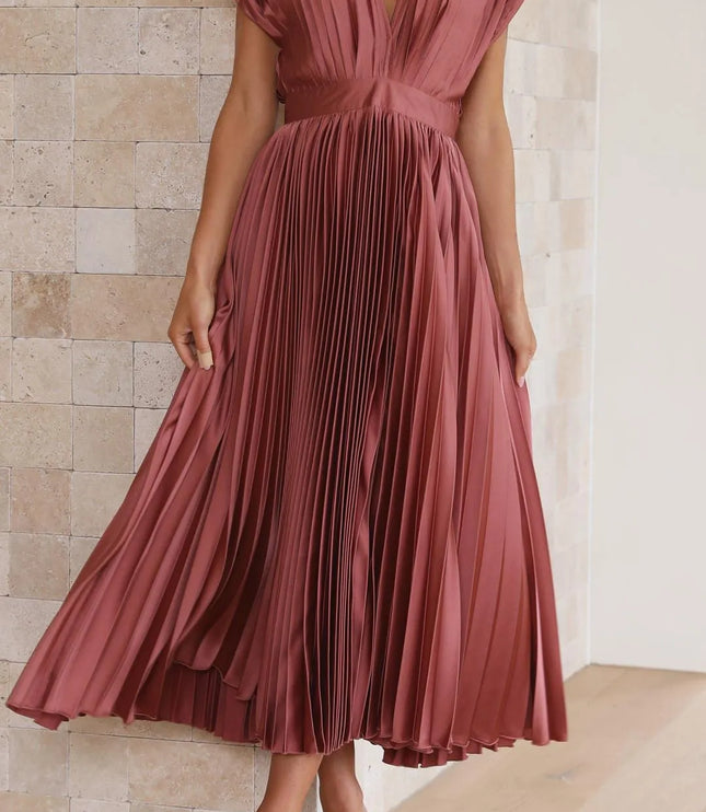 Front facing mauve high waisted midi dress with deep v-neck and pleated bodice
