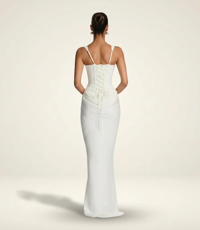 Back view of white maxi dress with lace-up corset back and thin straps