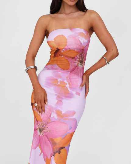 Close-up of strapless floral maxi dress bodice in lilac with pink and orange oversized blooms
