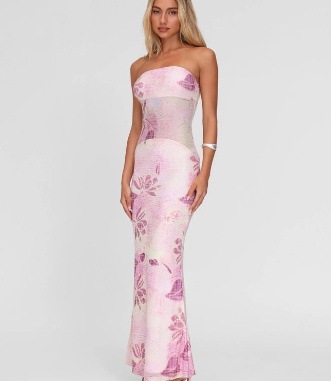 Side angle of pink floral strapless maxi dress showing curve-hugging fit and long hem