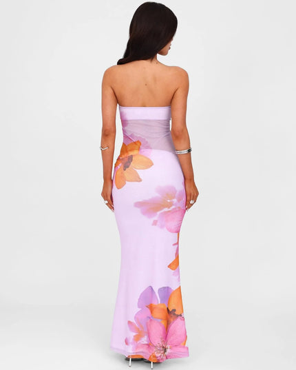 Back view of lilac strapless floral maxi dress with large pink and orange flower print