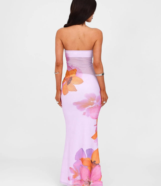 Back view of lilac strapless floral maxi dress with large pink and orange flower print