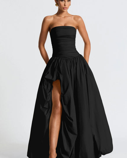 Black strapless ruched maxi dress with high-low hemline and full skirt